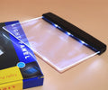 Flat panel LED reading light - brightness settings