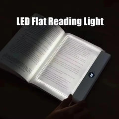 Flat panel LED reading light - book lamp in use
